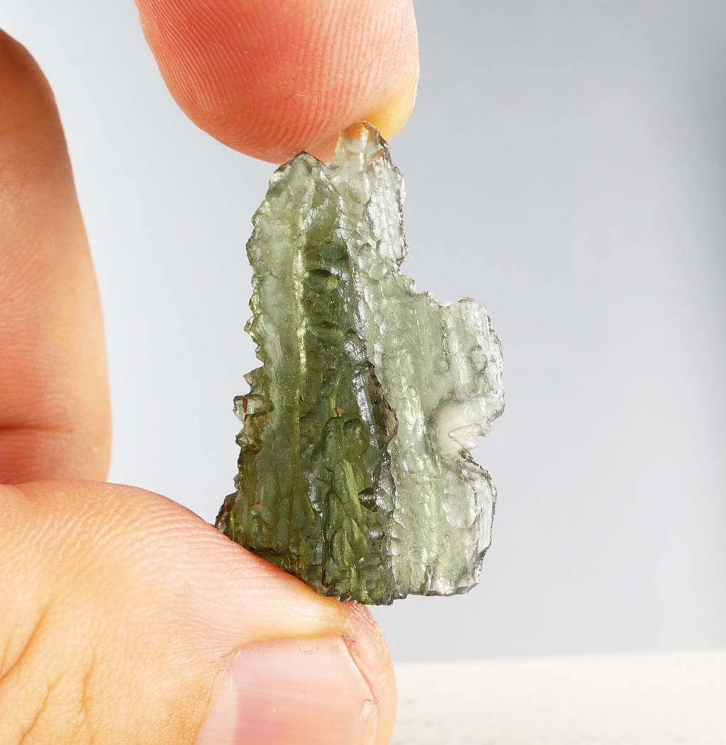 Moldavite mineral specimen, crystal specimen. top