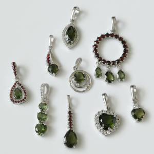 Faceted Moldavites with Garnet pendants for sale at www.pendant-world.com